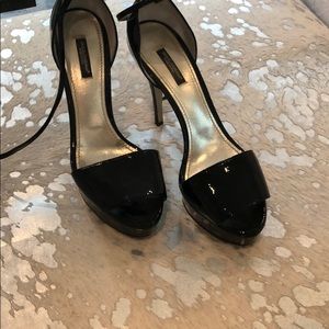 Black patent leather high heels